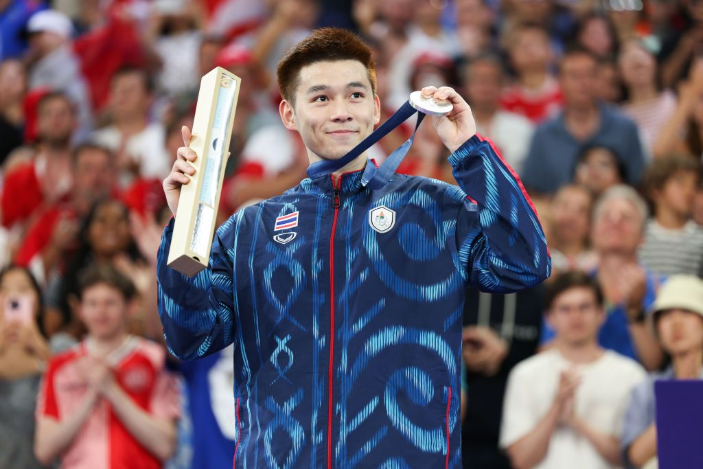 Kunlavut Vitidsarn claimed the silver medal in men's singles at the 2024 Paris Olympics, losing to Denmark's Viktor Axelsen in the final.